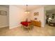 Charming dining room with tile floors, warm lighting, and quaint decor at 4748 Ballast Crest Cv, Land O Lakes, FL 34638
