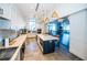 Modern kitchen featuring a center island, stainless steel appliances, and pendant lighting at 4748 Ballast Crest Cv, Land O Lakes, FL 34638