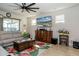 Relaxing living room with natural light and a view of the screened-in patio at 4748 Ballast Crest Cv, Land O Lakes, FL 34638