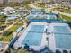 Aerial view of tennis and bocce ball courts in a beautifully landscaped community recreational area at 4748 Ballast Crest Cv, Land O Lakes, FL 34638
