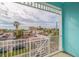 Balcony view overlooking the city, beach, and the waterfront at 11721 1St E St, Treasure Island, FL 33706