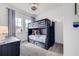 Nautical-themed bedroom featuring cozy bunk beds, nautical decor, and natural light with relaxing color palette at 11721 1St E St, Treasure Island, FL 33706