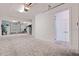 Spacious garage with brick floor and an adjacent door to the main house at 11721 1St E St, Treasure Island, FL 33706