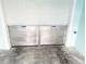 A flood-protecting garage door with a tiled floor at 11721 1St E St, Treasure Island, FL 33706