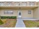 Inviting entryway with clean lines, updated features, and manicured landscaping offers an attractive welcome at 2351 Irish Ln # 21, Clearwater, FL 33763
