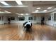 View of a banquet hall with tables and chairs at 401 Dorchester Pl # 62, Sun City Center, FL 33573