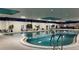 Well-maintained indoor pool facility with ample seating and plenty of light at 401 Dorchester Pl # 62, Sun City Center, FL 33573