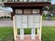 Mailboxes with dark brown trim and the numbers 619 and 620 on the posts at 401 Dorchester Pl # 62, Sun City Center, FL 33573