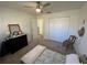 Inviting bedroom with neutral colors, carpet flooring, and ample natural light at 5730 16Th Ne Ln, St Petersburg, FL 33703