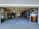 Spacious two-car garage with ample storage space and access to laundry appliances at 5730 16Th Ne Ln, St Petersburg, FL 33703