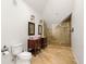 Bathroom featuring double sinks, stone floors and large glass shower at 6785 Burning Tree Dr, Seminole, FL 33777