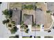 Aerial view of property with mature trees, fenced yard, and neighborhood at 18311 Arbor Crest Dr, Hudson, FL 34667