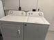 Practical laundry area with standard washer and dryer units at 3602 Cambridge W Dr, Bradenton, FL 34205