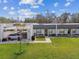 Exterior of the property with well-maintained landscaping and covered parking at 4732 Lake Blvd # A, Clearwater, FL 33762