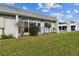 Charming exterior view with landscaped front yard and carport at 4732 Lake Blvd # A, Clearwater, FL 33762