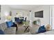 Open living area with dining, neutral decor, and lots of natural light at 4732 Lake Blvd # A, Clearwater, FL 33762