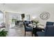 Cozy living room with dining area, modern decor, and plenty of natural light at 4732 Lake Blvd # A, Clearwater, FL 33762