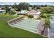 Aerial view showcasing the shuffleboard courts alongside the clubhouse and community pool at 4732 Lake Blvd # A, Clearwater, FL 33762