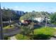 Scenic aerial view of the community showcasing lush greenery, a pool, and parking area at 6315 Shoreline Dr # 3208, St Petersburg, FL 33708