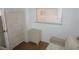 Cozy bedroom featuring white wicker furniture and a bright window view at 6315 Shoreline Dr # 3208, St Petersburg, FL 33708