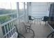 Enclosed patio with tile flooring and seating for relaxing outdoors at 6315 Shoreline Dr # 3208, St Petersburg, FL 33708