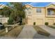 Charming townhome featuring a two-car garage, well-kept lawn, and inviting curb appeal at 9111 Moonlit Meadows Loop, Riverview, FL 33578
