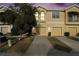 Charming two-story townhouse features an attached garage and well-maintained lawn at 9111 Moonlit Meadows Loop, Riverview, FL 33578