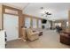 Bright living space boasts tile entryway and flows into dining and kitchen areas at 9111 Moonlit Meadows Loop, Riverview, FL 33578