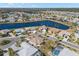 Aerial view of a community featuring lakes and lush landscaping at 1311 Caloosa Lake Ct, Sun City Center, FL 33573