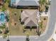 Aerial view of roof and landscaping for a well-maintained home at 1311 Caloosa Lake Ct, Sun City Center, FL 33573
