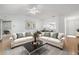 Bright living room offering comfortable seating and stylish decor, creating a welcoming atmosphere at 1311 Caloosa Lake Ct, Sun City Center, FL 33573
