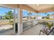 Inviting screened porch with seating and serene views of the neighborhood, ideal for relaxing outdoors at 1311 Caloosa Lake Ct, Sun City Center, FL 33573