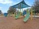 playground with slides, climbing structures, and shaded areas at 8463 Canyon Creek Trl, Parrish, FL 34219