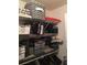Well-organized closet with multiple shelves and hanging space for efficient storage solutions at 2060 Marilyn St # 133, Clearwater, FL 33765