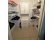 Organized walk-in closet with shelving, drawers, and ample storage space at 2060 Marilyn St # 133, Clearwater, FL 33765