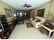 Spacious living room features tile floors, neutral paint, and contemporary furnishings at 2060 Marilyn St # 133, Clearwater, FL 33765