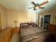 Comfortable main bedroom with ceiling fan, neutral decor and carpet flooring at 2060 Marilyn St # 133, Clearwater, FL 33765