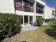 Outdoor patio area with chairs and a table, perfect for relaxing at 2060 Marilyn St # 133, Clearwater, FL 33765