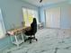 Office space with a view, featuring marble tile flooring, computer chair and desk at 2311 Brisbane St # 65, Clearwater, FL 33763