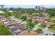 Aerial shot of the neighborhood showcasing homes with well-kept lawns, mature trees, and proximity to Tampa at 2335 Heron Cir, Clearwater, FL 33762