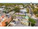 Aerial view of a landscaped rooftop terrace with a hot tub, showcasing the attractive nearby neighborhood at 2419 Victoria Gardens Ln, Tampa, FL 33609