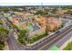 Aerial view showing the well-maintained buildings with rooftop terraces and the surrounding cityscape at 2419 Victoria Gardens Ln, Tampa, FL 33609