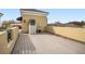 Spacious rooftop deck featuring durable composite decking, a hot tub, and space for outdoor entertaining at 2419 Victoria Gardens Ln, Tampa, FL 33609