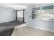 Bright living room with large windows and a view to the carpeted living room at 8501 47Th N St, Pinellas Park, FL 33781