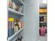 Storage area with items on shelves and doorway to additional storage space at 8501 47Th N St, Pinellas Park, FL 33781