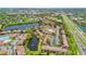 An aerial view showcases the community with convenient highway access and beautiful water views, offering a blend of comfort and accessibility at 880 S Village Lake N Dr # 106, St Petersburg, FL 33716