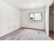 A bright bedroom featuring a window and a closet at 880 S Village Lake N Dr # 106, St Petersburg, FL 33716