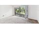 Bedroom featuring large window, views of the lake and fountain at 880 S Village Lake N Dr # 106, St Petersburg, FL 33716
