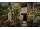 A charming entrance with lush tropical landscaping and a well-maintained facade at 880 S Village Lake N Dr # 106, St Petersburg, FL 33716