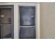 Close up of the front door, number 106, with screen door to the left at 880 S Village Lake N Dr # 106, St Petersburg, FL 33716